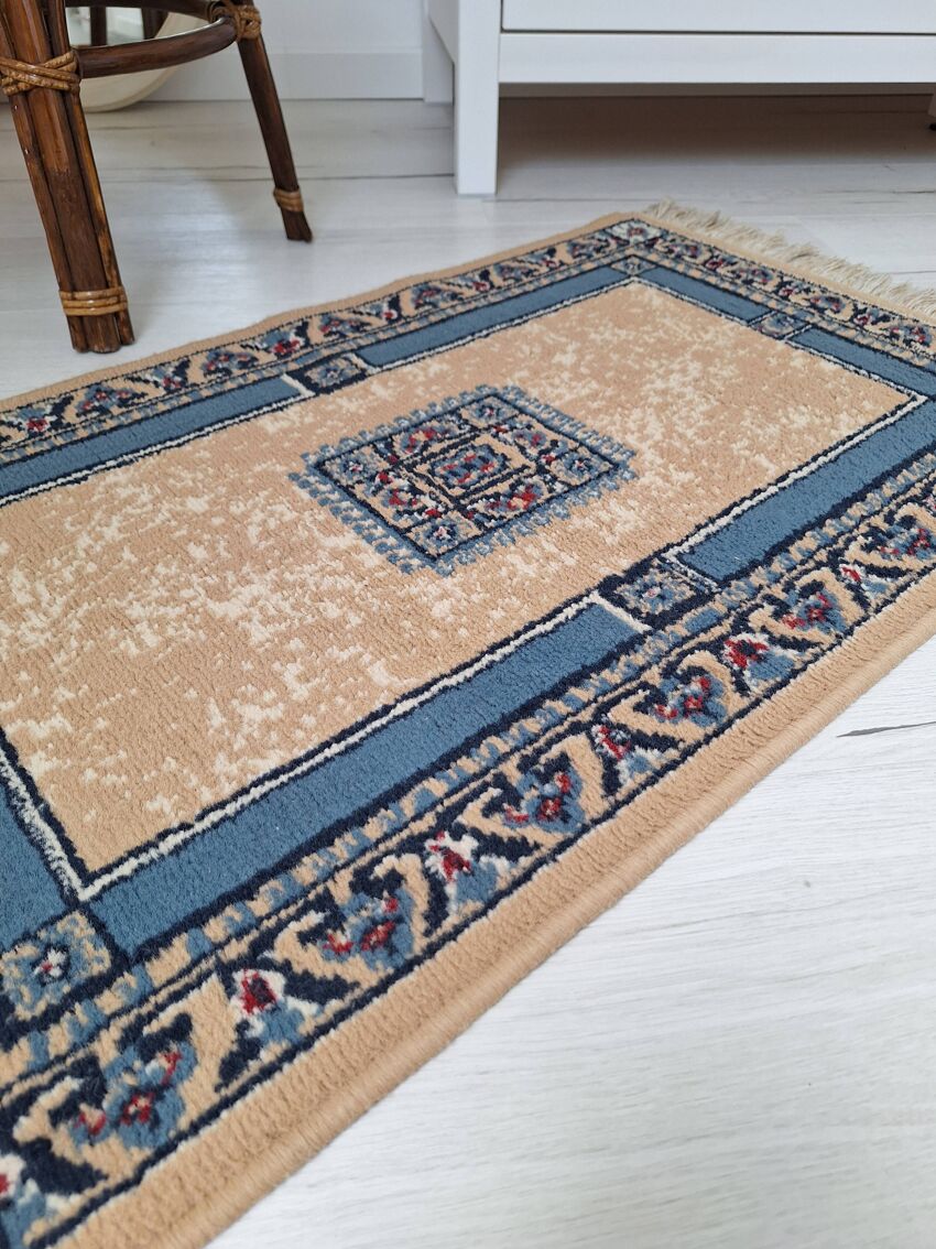 Beige and blue Persian rug