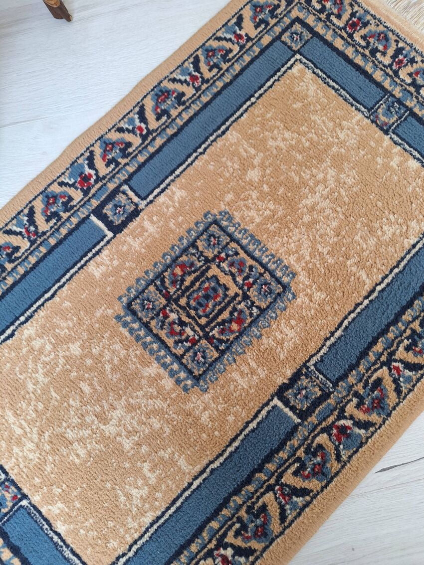 Beige and blue Persian rug