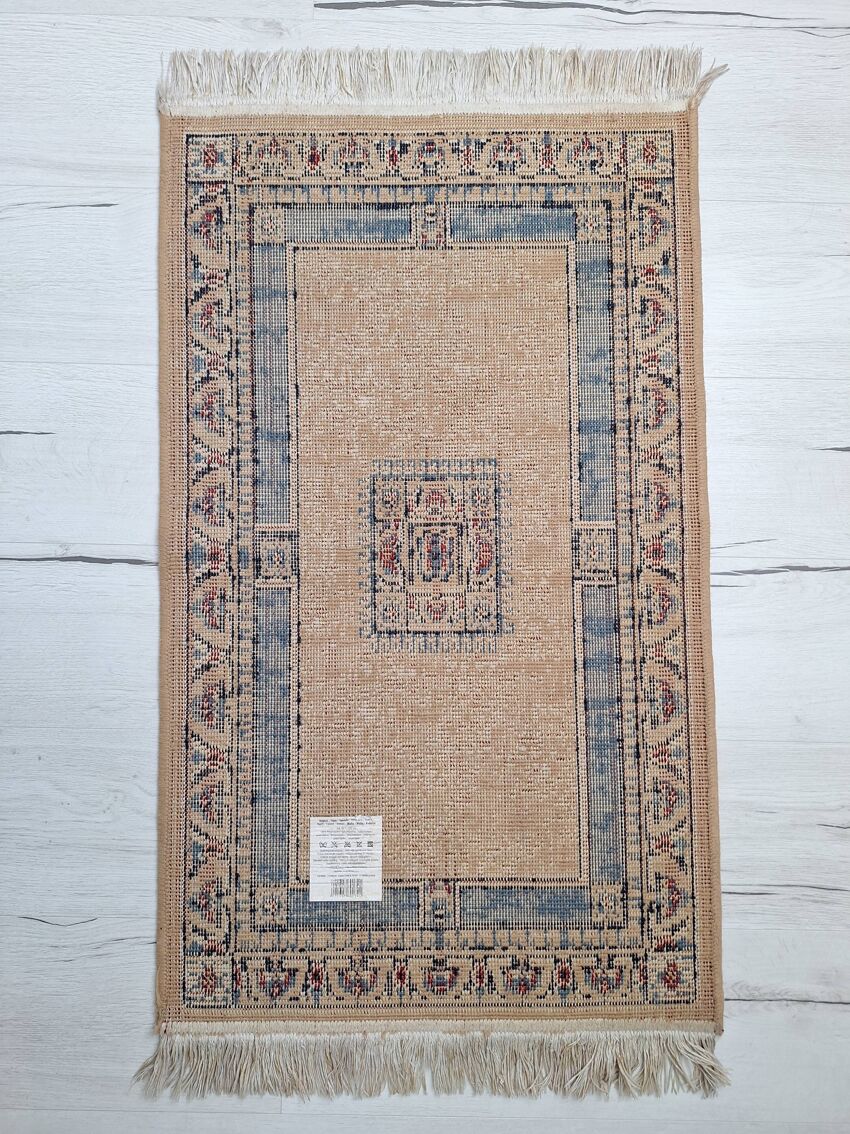 Beige and blue Persian rug